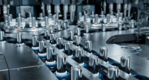 Lithium-ion battery cells moving along a production line conveyor