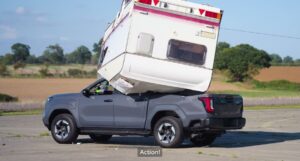 Toyota Drops a Caravan on Its Electric Hilux