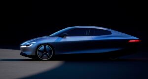 Blue Volkswagen Mission Efficiency prototype seen from the side against a black background